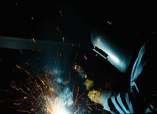 can you use a welding helmet in low light or dark environments
